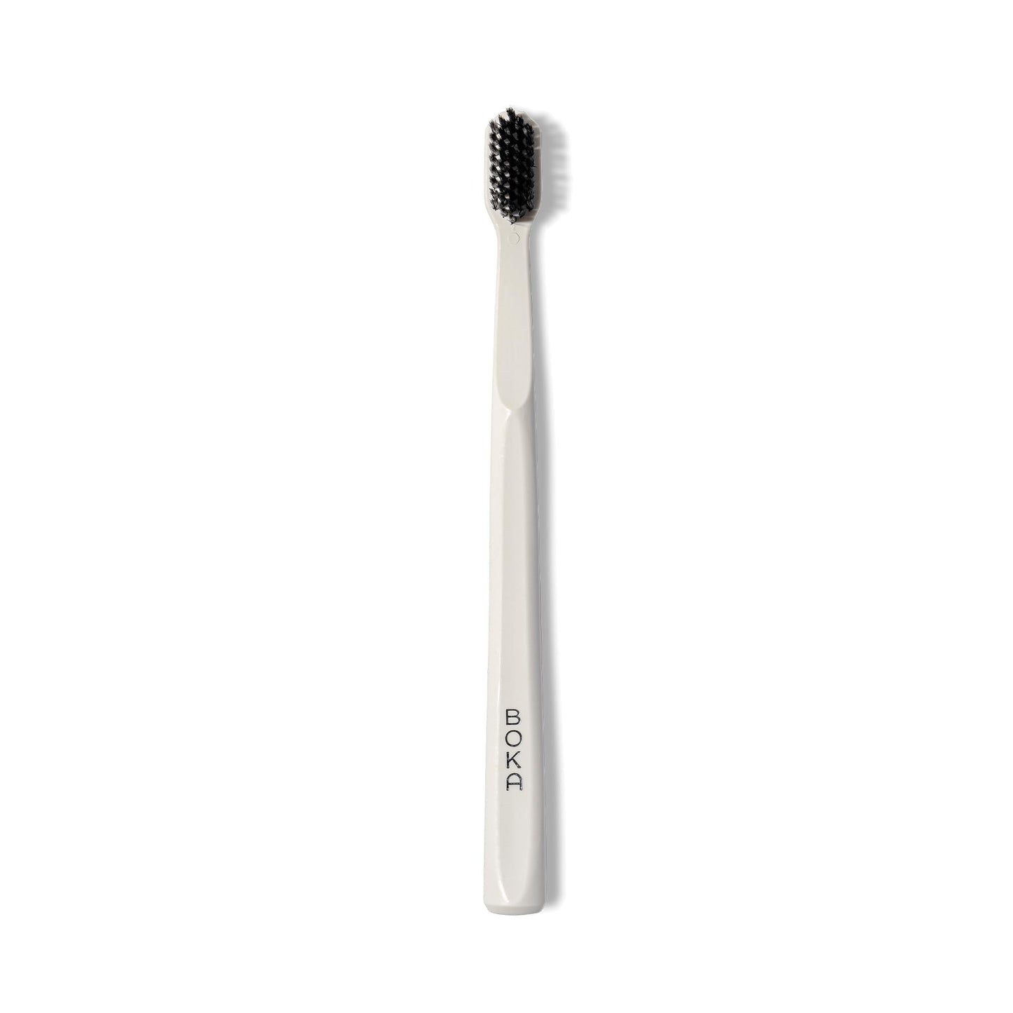 Boka Classic Manual Toothbrush with Extra Soft Activated-Charcoal, Tapered Bristles, Bioplastic Handle that Includes Travel Cap, Dentist-Approved, Great for Adults and Kids, White (Pack of 1)