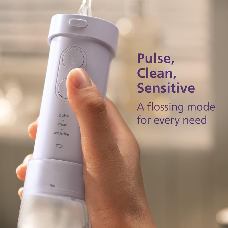 Philips Sonicare Portable Water Flosser - 3 Flossing Modes, IPX7 Waterproof | Compact Travel Design, Purple, Model HX3333/23